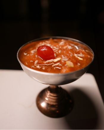 Bicyclist looking out over hill at ocean